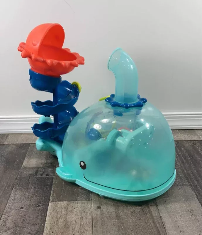 B. toys Musical Whale Ball Popper